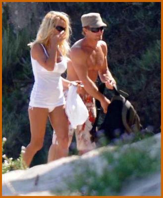Pamela Anderson Sexy in White Bikini in Malibu Beach